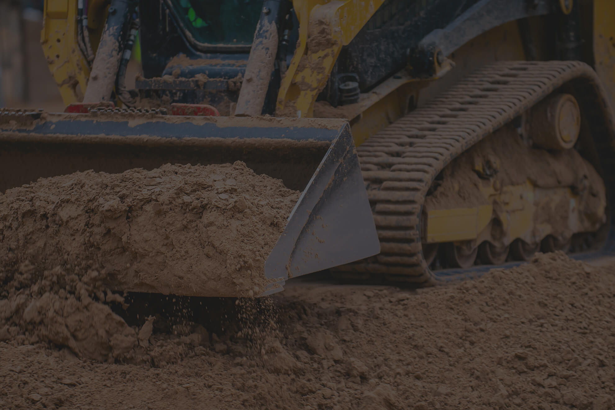 Track Skid Steer Loader with Bucket Attachment
